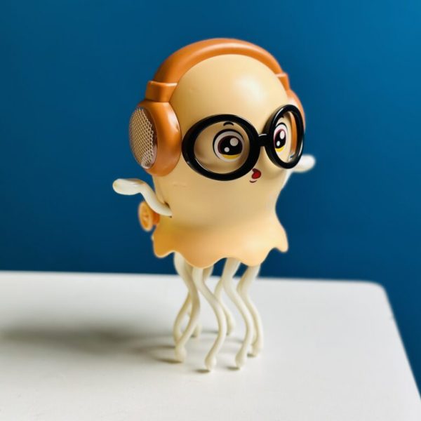 "Magical Dancing Jellyfish Toy floating and spinning in water, colorful LED light aquatic toy for kids and home decoration"